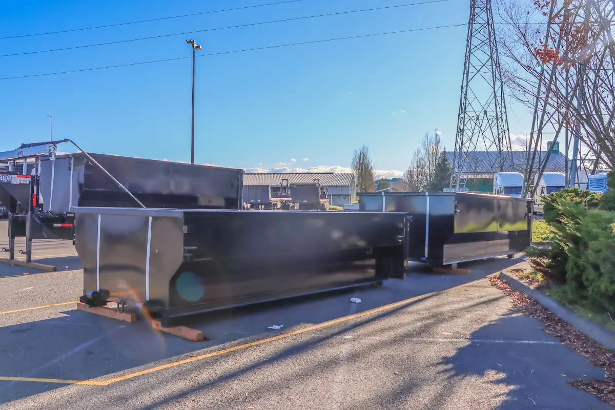 Roll-off dumpster ready for waste disposal at job site for 2 Yard Dumpster Rental in Baltimore Highlands